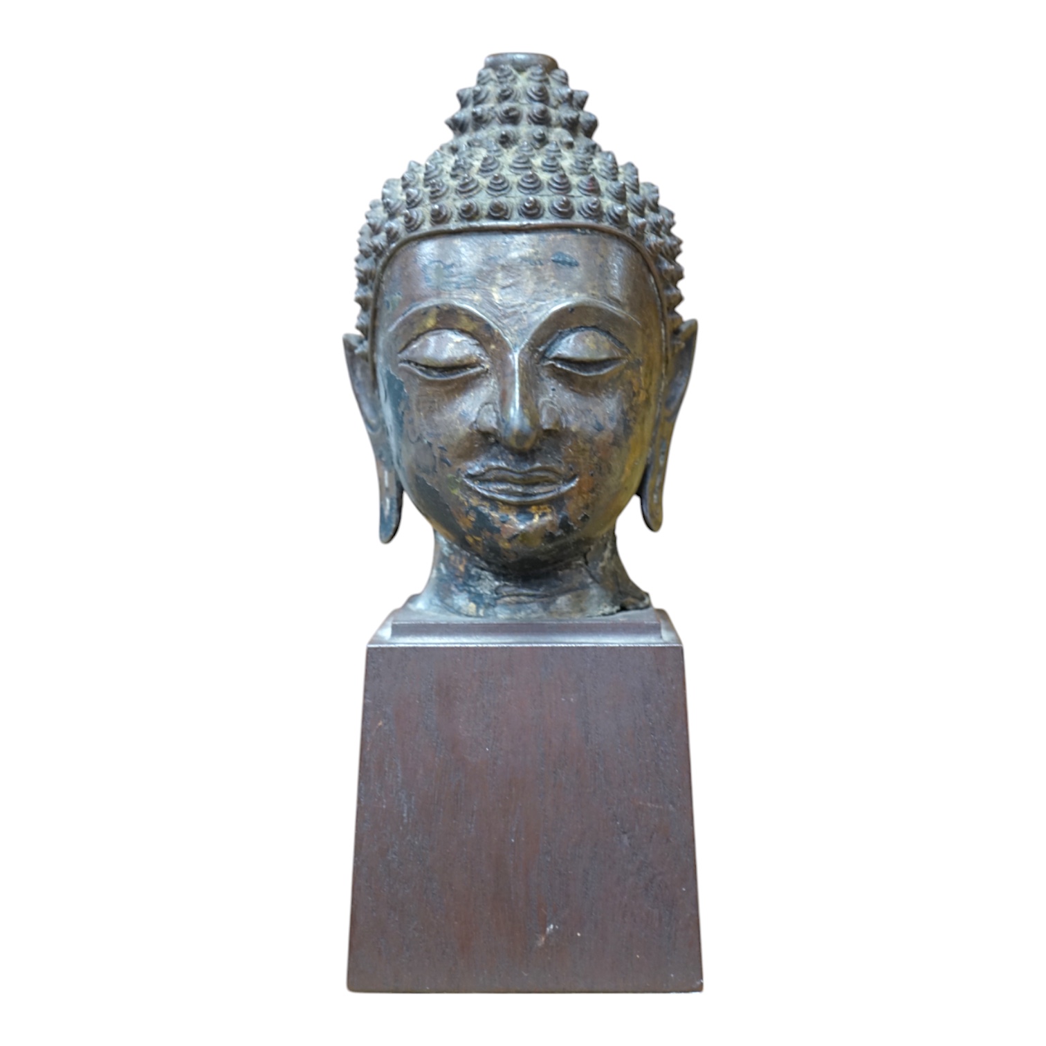 A Thai bronze head of Buddha, probably 18th century, 25cm high. Condition - good